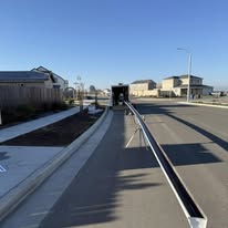 Slightly Sloped Seamless Rain Gutters - Business Photo Gallery Image