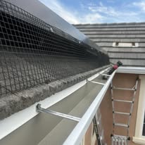 Slightly Sloped Seamless Rain Gutters - Business Photo Gallery Image