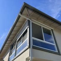 Slightly Sloped Seamless Rain Gutters - Business Photo Gallery Image